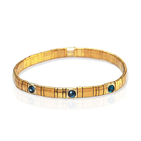 Gold Tila Bead Bracelet with Starburst Charms